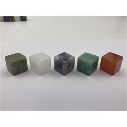 Fifteen cube mineral specimens, each cut and polished to highlight natural formations, including tiger eye, black obsidian, green aventurine, rose quartz, opalite, rhodonite etc, H2cm 