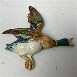 Set of five Beswick graduated wall mounting figures of flying ducks, models from 596/0 to 596/4, largest L29cm