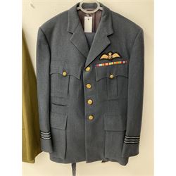 RAF Flight Lieutenant's uniform with peaked cap and WW2 ribbon bar; WW2 gas mask in blue canvas bag dated 1942; flying helmet date 1984; and British Army Major's uniform with Staybrite buttons and peaked cap