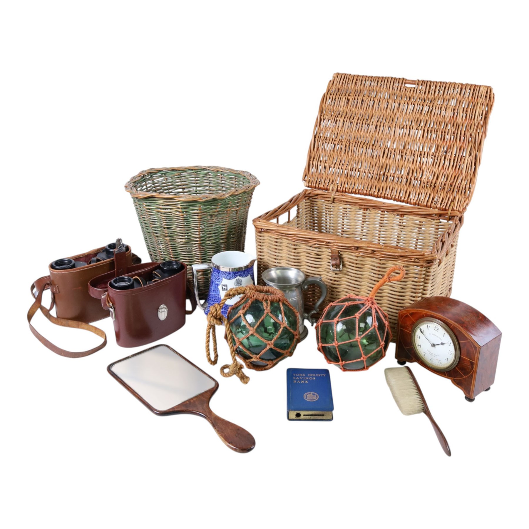 Wicker picnic hamper together with wicker waste basket, Barr & Stroud and Carl Zeiss 8x30 binoculars in leather cases; early 20th cent. inlaid mahogany mantel clock, 1950's 'York County Savings Bank' money box, green glass fishing floats etc. 
