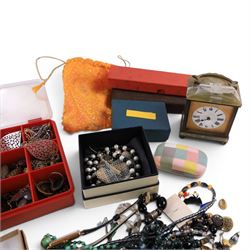 Collection of silver and costume jewellery, including earrings, brooches, beaded necklaces, Onyx table clock, wristwatches, etc