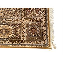 Persian Tabriz ivory ground rug, the field centred by a shaped floral medallion with swirling spandrels, richly decorated with foliate motifs, the broad border with matching cartouches and palmettes, within multiple guard stripes