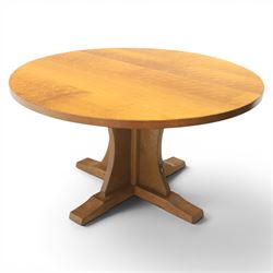 Mouseman - circular adzed oak circular dining table, on quatriform base with carved mouse signature, by the workshop of Robert Thompson of Kilburn