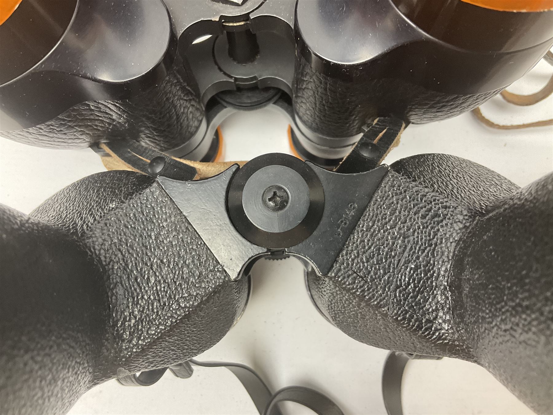 Ten cased pairs of binoculars, to include Ross London Steplux 7x50, Ross Solaross 16x60, Crescent zoom 7x- 12x50, Hilkinson 20x60,  Ross Stepnada 7x30,  Philo 10x50 etc