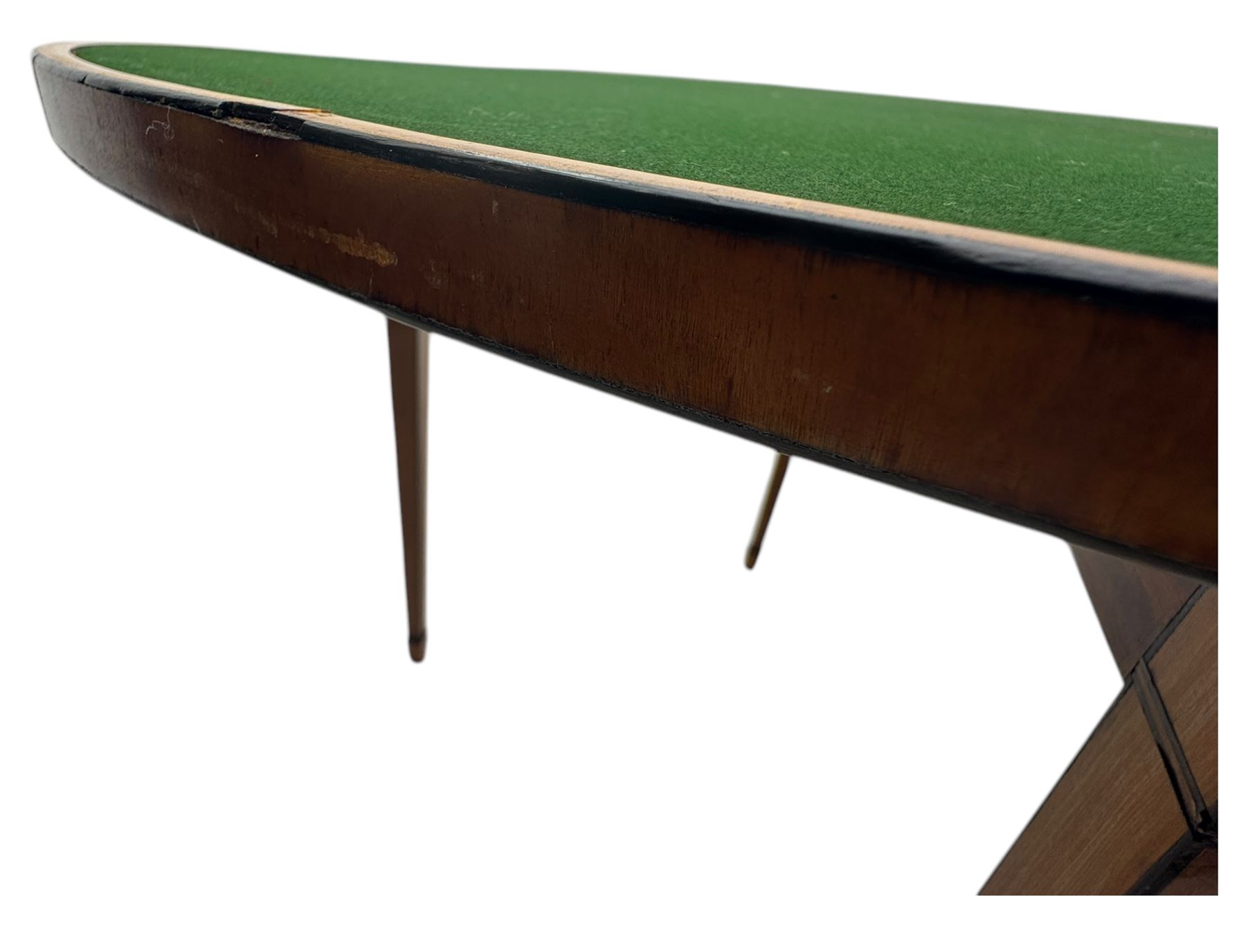 Edwardian satinwood inlaid demi-lune card table, hinged fold over green baize lined interior, raised on square tapered supports with spade feet  