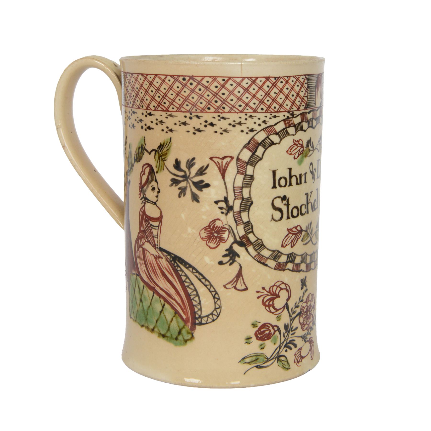Late 18th century creamware documentary tankard, of cylindrical form with curbed handle, inscribed 'John & Dorothy Stockel 1783', above a floral spray and flanked by a seated female figure to one side, and bull and house to the other, H16.5cm