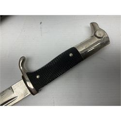 German Wehrmacht KS98 dress bayonet, with plain 19.5cm fullered blade marked Anton Wingenje Solingen, chequered black plastic grip and original leather washer to ricasso; in black painted metal scabbard L36cm overall