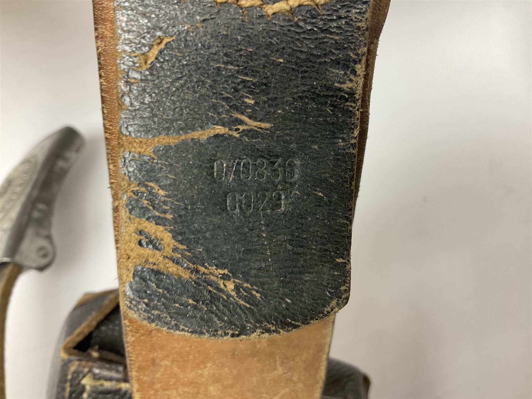 WW2 German 'SS' leather belt with six pouches (one containing unused field bandage) and buckle inscribed 'Meine Ehre Heifst Treue'; belt marked 0/0836 0029
