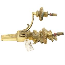 Period design gilt brass wall light, by Beardmore, London, with French empire motifs, including a helmet, oak leaves and acorns, quiver, each arm with acanthus leaf decoration, wired for electricity, with original label, H36cm  
Provenance: property of a Nobleman
