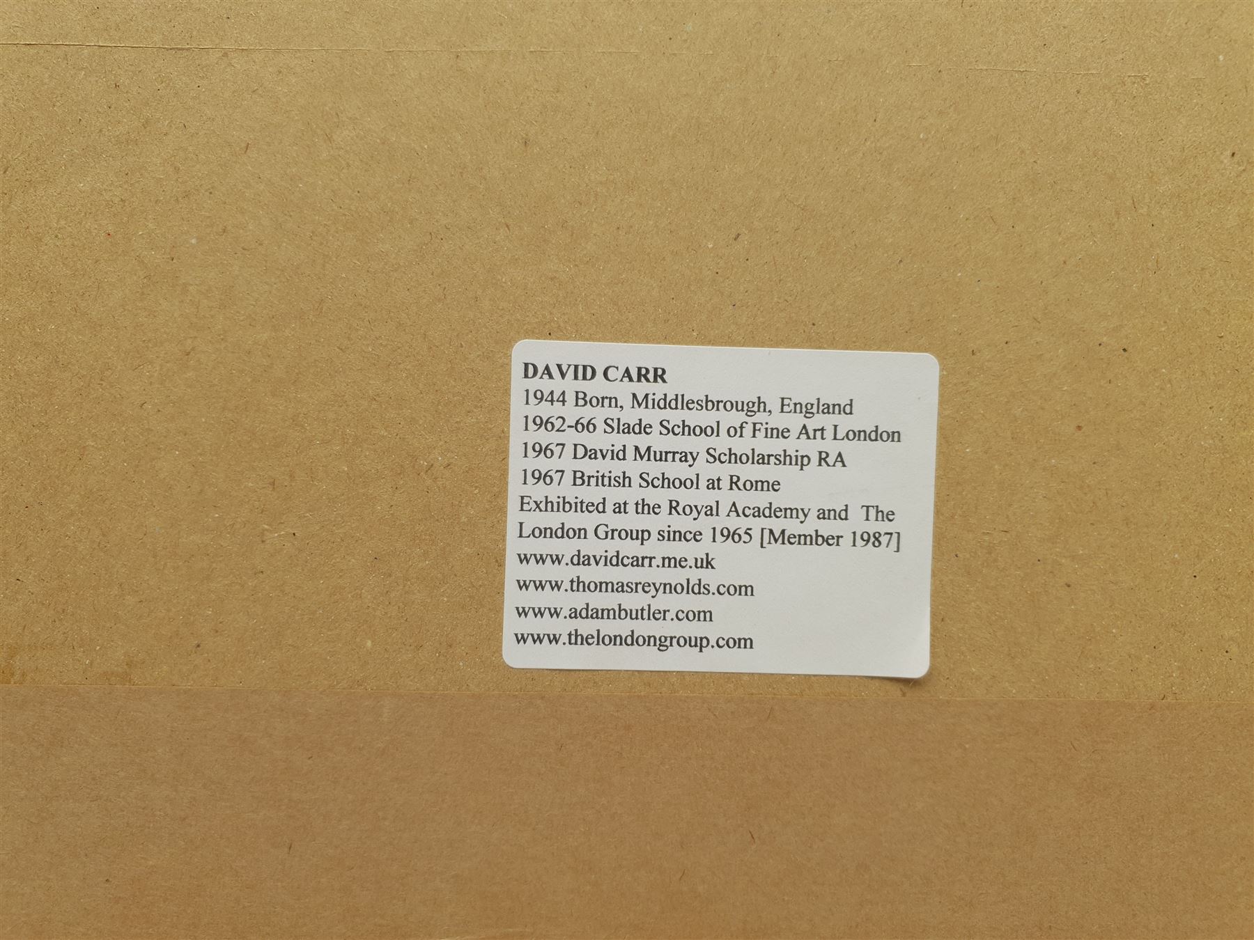 David James Carr (Northern British 1944-2009): Whitby East Cliff, oil on board signed 20cm x 40cm