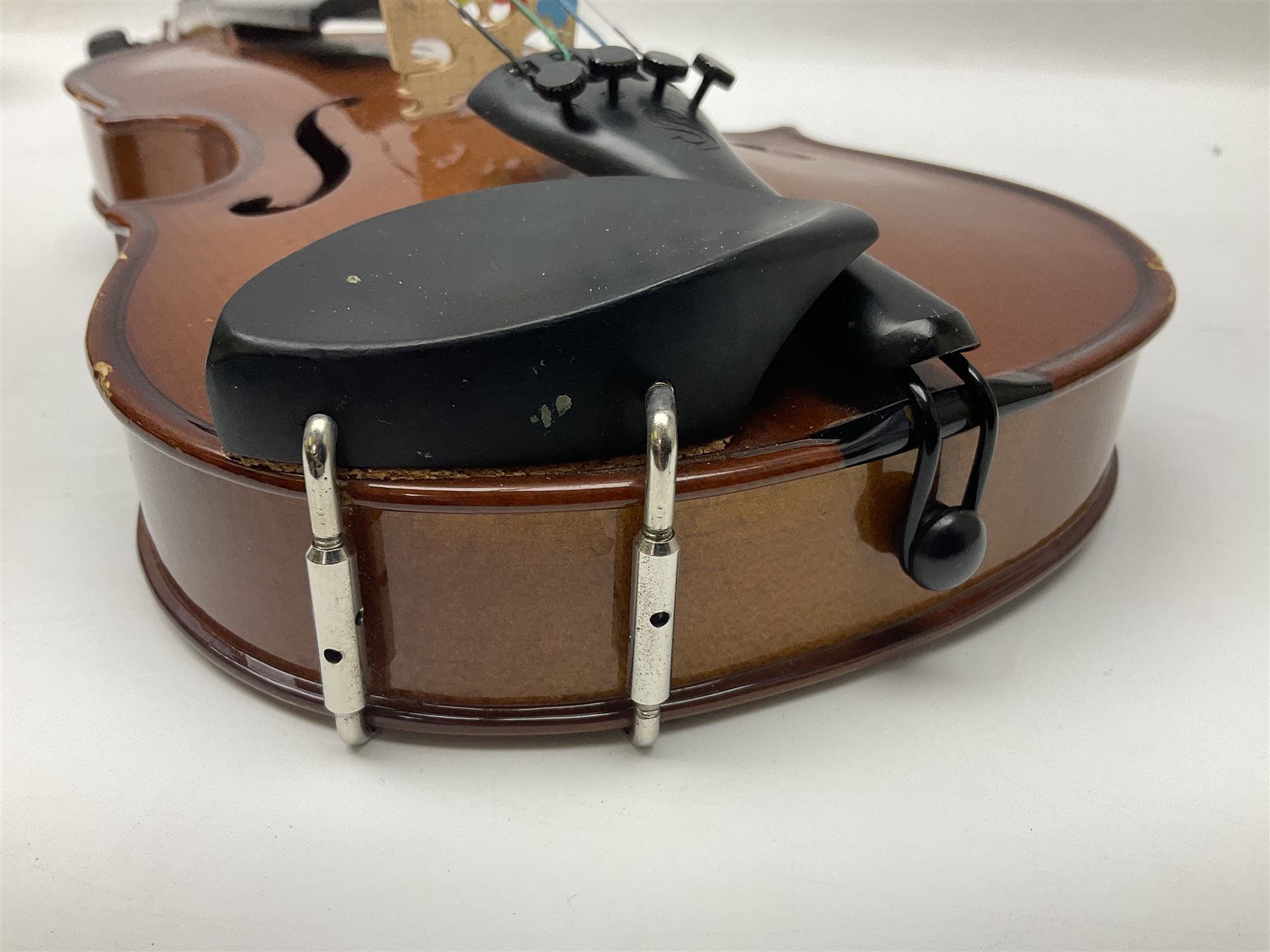 Three Stentor Student violins - three-quarter size with 33cm two-piece back; and two quarter size each with 28cm two-piece back; each in carrying case with bow (3)