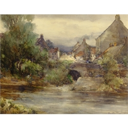 Bertha Rhodes (Carrick) (British exh.1905-1912): Village with River, watercolour signed 27cm x 37cm