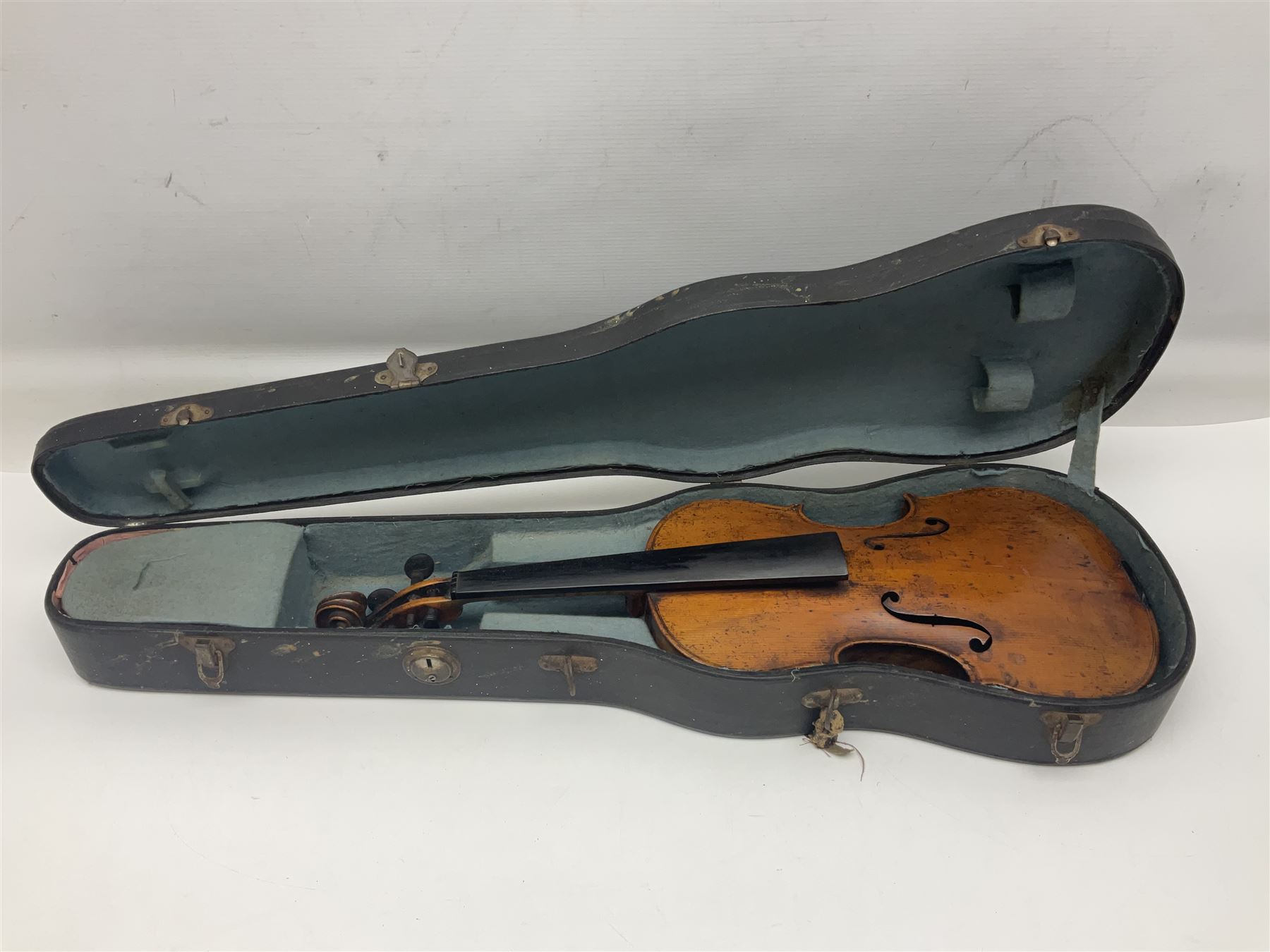 Late 19th century German trade violin c1890 with 36cm two-piece birds-eye maple back, neck and ribs and spruce top; bears label 'Manufactured in Berlin Special Copy of Nicolaus Amati' L59.5cm; in carrying case