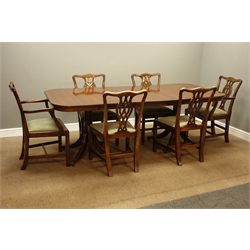  Regency style mahogany twin pillar dining table, on moulded splayed supports with claw cups and castors, additional leaf (H77cm, 216cm x 100cm (with leaf)), and six Chippendale style chairs with upholstered drop in seat  