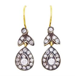 Pair of gold and silver diamond earrings, each pendant with pear shaped drop set with roun...