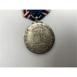 Collection of WW2 and police medals c.1933-1955, awarded to Eric Drinkwater comprising 1939-45 War Medal, Defence Medal, 1939-45 Star and Burma Star, on wearing bar; 1918-62 General Service Medal with Cyprus clasp to P.S. E.G. Drinkwater; boxed; Police Long Service and Good Conduct Medal to Const. Eric C. Drinkwater; cased; Royal Life Saving Society bronze medal to E.C. Drinkwater July 1933; boxed; and George V 1937 coronation medallion; boxed.