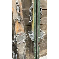 Two pairs of vintage skis, L207cm and 197cm
