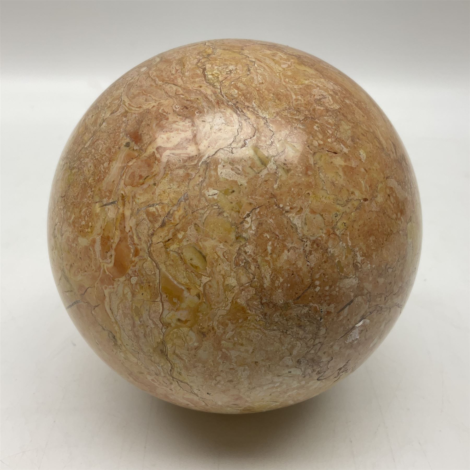 Large pink veined marble sphere, with yellow and grey undertones, D14cm