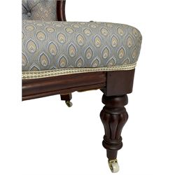 Victorian walnut framed open armchair, scrolled arm terminals over spiral turned arm supports, upholstered in foliate patterned fabric with sprung seat, on turned supports and brass castors (W65cm H92cm); and Victorian mahogany nursing chair with lobe carved supports (W60cm H92cm)