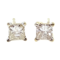  Pair of gold diamond stud earrings, stamped 14K  