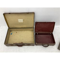 Three vintage leather brown suitcases, together with a Stella advertising mirror and Hornby and other trains