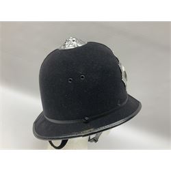 British Transport Police Custodian helmet with Queen's Crown plate; Hiatt & Co ebonised hardwood patrol truncheon; and pair of Hiatts 1960 hand-cuffs (3)