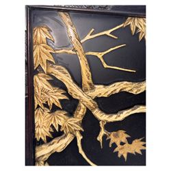 Meiji period (1868–1912), signed Shibayama carved hardwood lacquer panel inlaid with mother-of-pearl and ivory, decorated in high relief and inlaid, depicting two birds of prey with locked talons and beaks on leafy tree branch, signature in lower right corner, in original frame. This item has been registered for sale under section 10 of the APHA Ivory Act