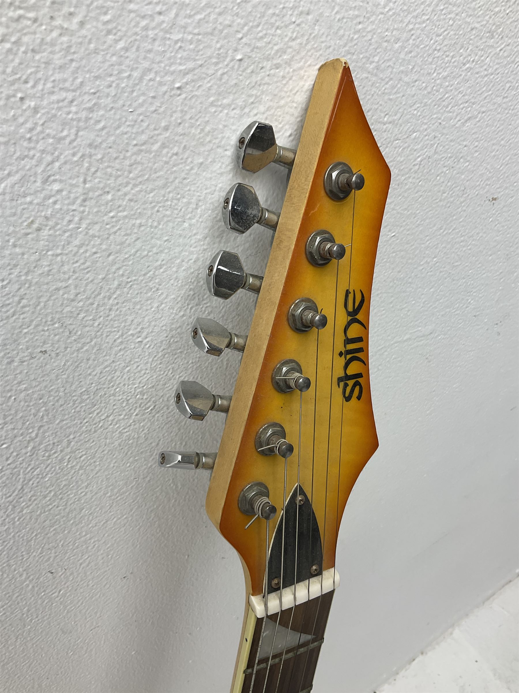 Shine offset V-shaped six string electric guitar, in fitted case
