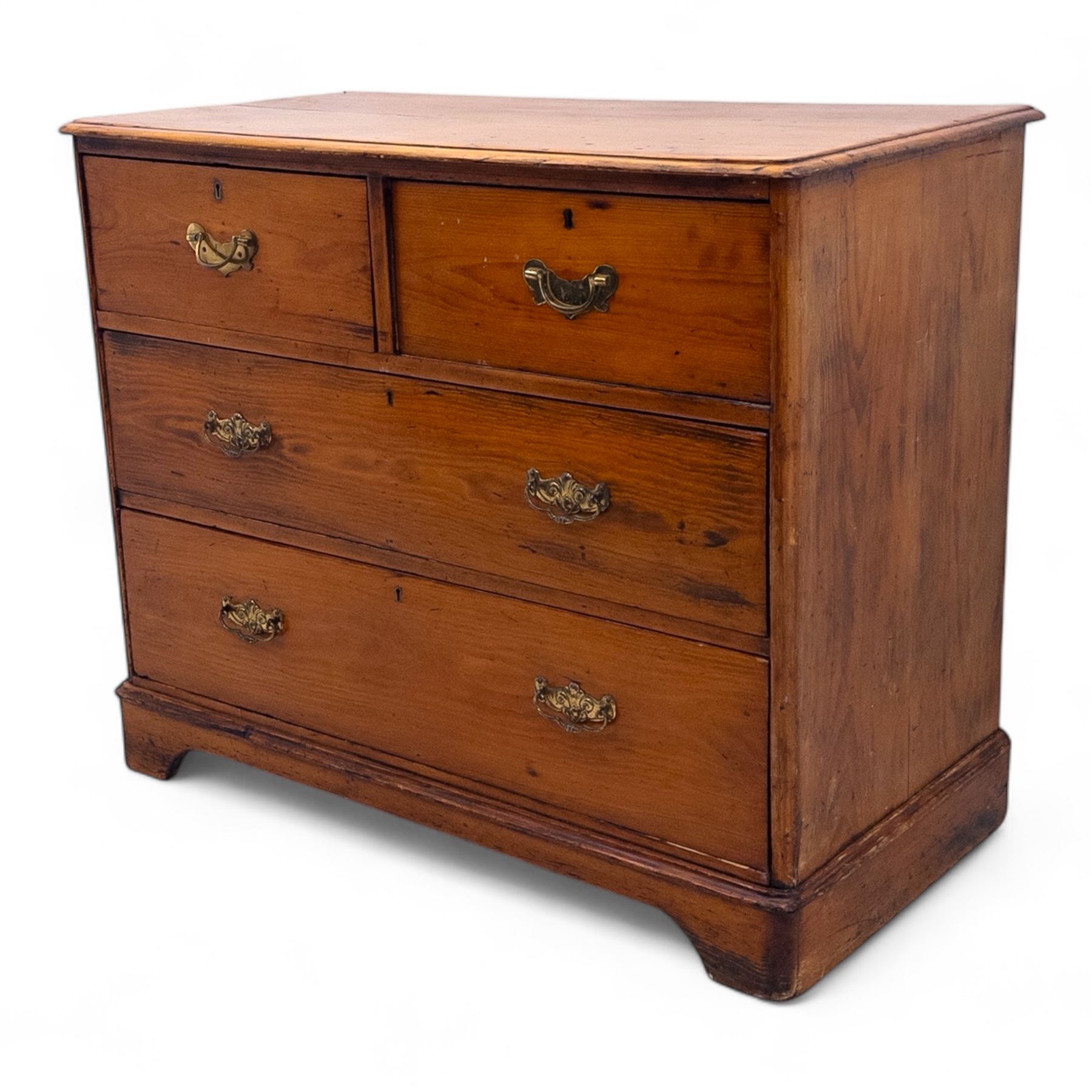 19th century pine chest of drawers, rectangular moulded top over two short and two long drawers fitted with brass handles, raised on bracket feet