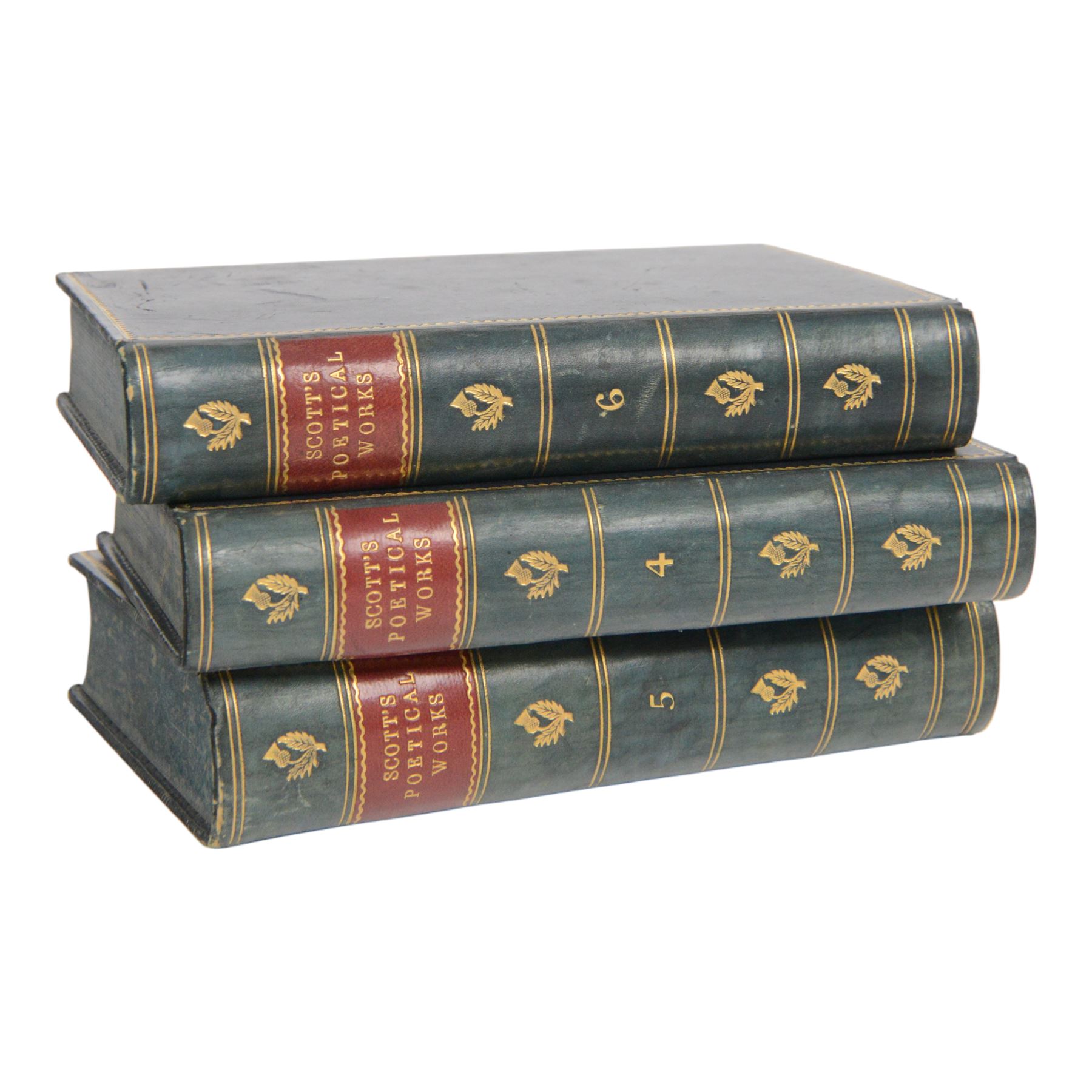 Edwardian book trough, the serpentine ends with boxwood stringing, pierced foliate keyhole shaped detail, and integrated shaped supports, housing Scott, Sir Walter, Poetical Works, Edinburgh, 1868, 12 vols, book trough 18.5cm x 38cm x 22.5cm
