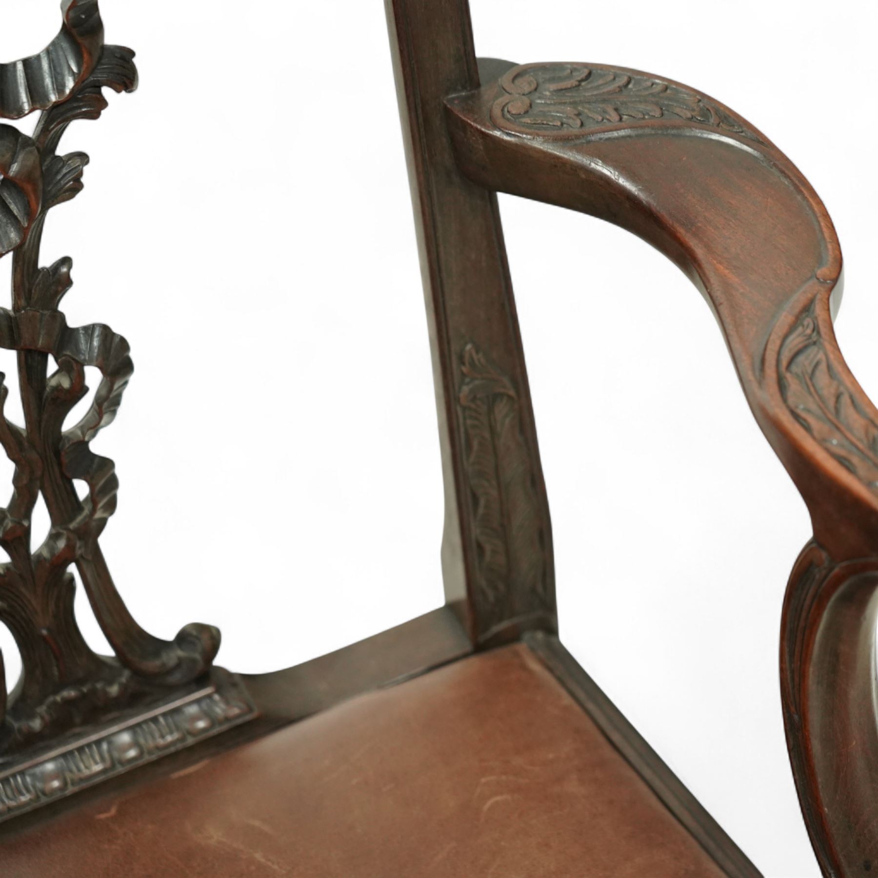 Set of eight 20th century Chippendale design mahogany dining chairs, including two carvers, each with pierced ribbon back splat carved with acanthus leaves, drop-in leather upholstered seats, moulded seat rails, on cabriole legs with ball and claw feet