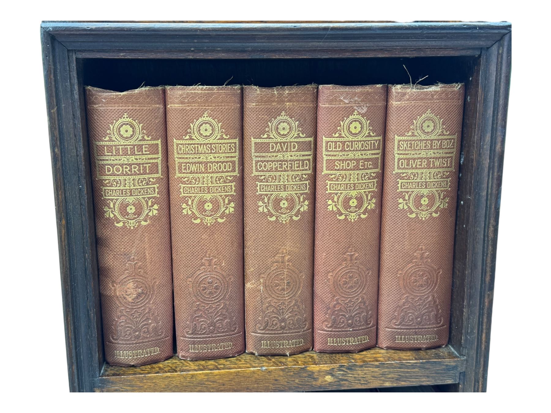 20th century oak barley twist gateleg table (W78cm); early 20th century narrow oak bookcase with Charles Dickens novels (W31cm, H93cm) 