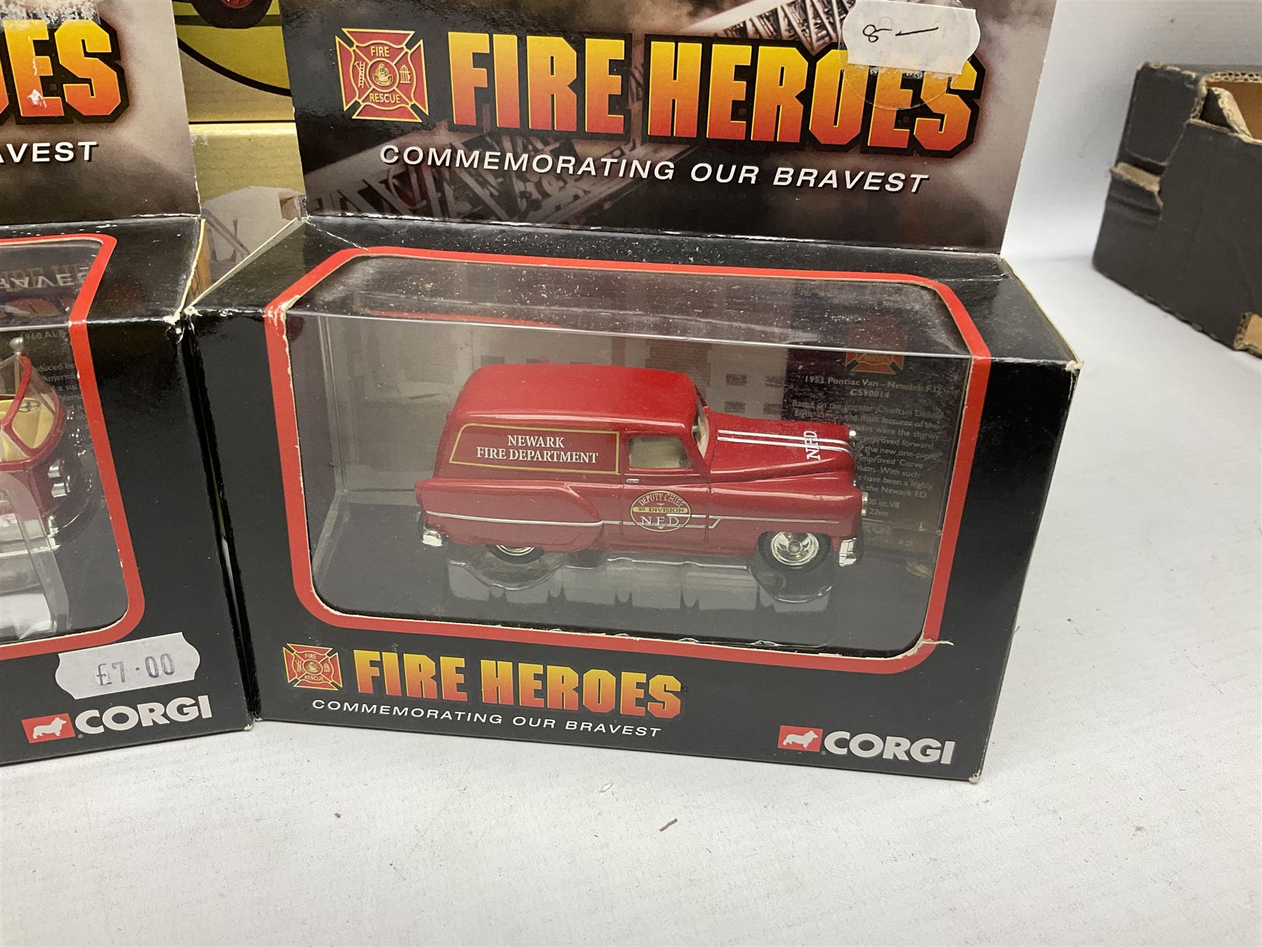 Corgi - eleven fire-fighting vehicles comprising limited edition 54706 E1 Side Mount Washington DC and 54902 E1 75ft Ladder Duncan Fire Department; 97392 Simon/Dennis Hydraulic Platform; 97361 AEC Turntable Ladder;  and seven 'Fire Heroes'; all boxed (11)