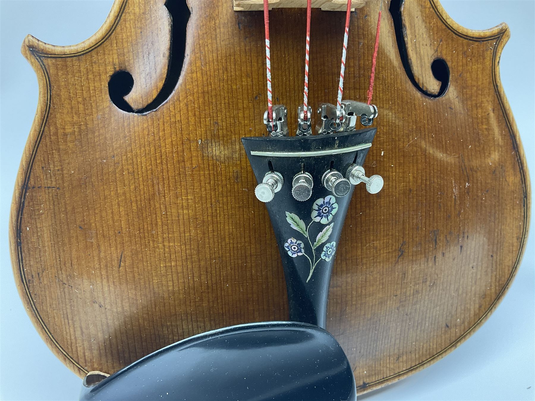 German Saxony violin c1900 with 35.5cm two-piece medium grain maple back and ribs and medium grain spruce top; bears label 'Jacobus Stainer in Absam prope Oenipontum 17xx Made in Germany', 59.5cm overall; with modern bow (2)