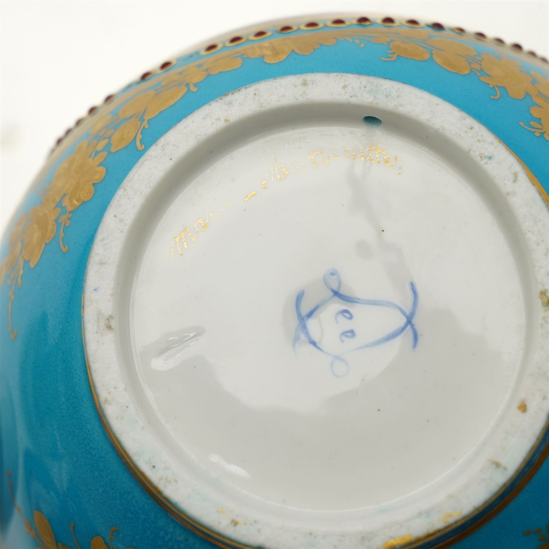 Sevres dejeuner 'Bleu turquoise' tea service for six covers, decorated by Charles-Eloi Asselin, comprising six teacups and saucers, teapot, milk jug and covered sucrier, the bleu de ciel ground painted with portraits of the French courtiers, each piece with name to base (some rubbed) of those depicted, to include Marie Antoinette (teapot), Madame de Montesson, Madame du Barry, Madam de Genlis, Madame Elizabeth (sucrier), Madame de Lamballe (milk jug) Madame Victoire, and two others unidentified, within finely painted gilt surround, each portrait encircled by red jewelled borders, the saucers with corresponding monograms within similar floral gilt and jewelled borders, Sevres mark to base with painted 'ee', dating these 1782, teapot H14cm 