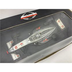 Four Minichamps 1:18 scale die-cast racing cars - Williams F1 Team BMW FW26 R. Schumacher; McLaren Mercedes MP4-12 D. Coulthard; McLaren Mercedes MP4-13 M. Hakkinen; and Formel 1 Jordan peugeot EJR 195 E. Irvine; all boxed (4)