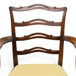 Pair of Georgian design Chippendale style mahogany elbow chairs, the pierced and waived ribbon ladder-back over scrolled arm terminals and yellow drop-in seats, on moulded and chamfered square supports