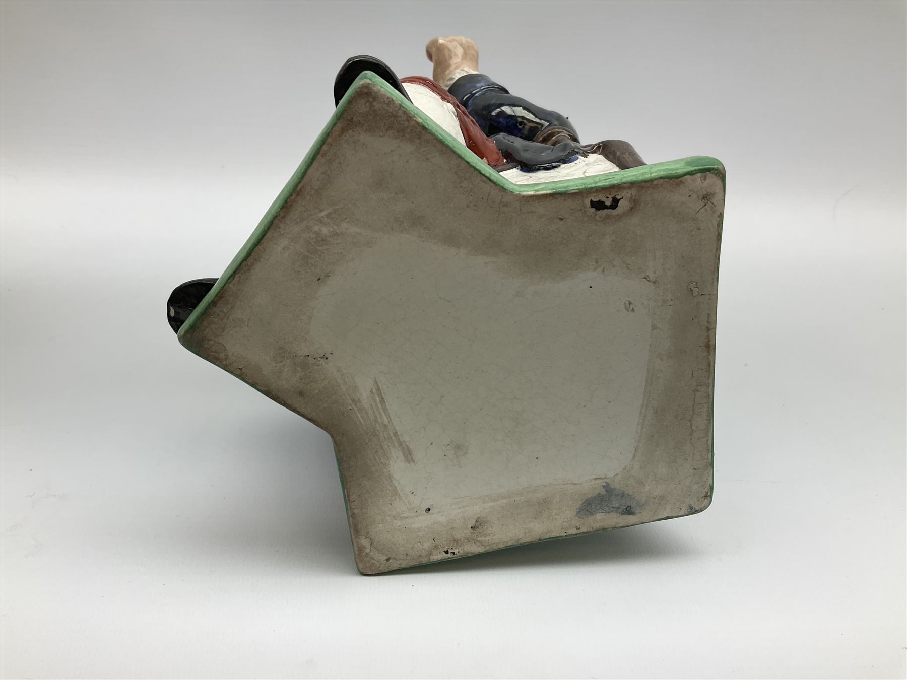 Early 20th century Staffordshire William Kent Squire toby jug, modelled seated upon a corner chair holding a jug of ale in his right hand, H28cm