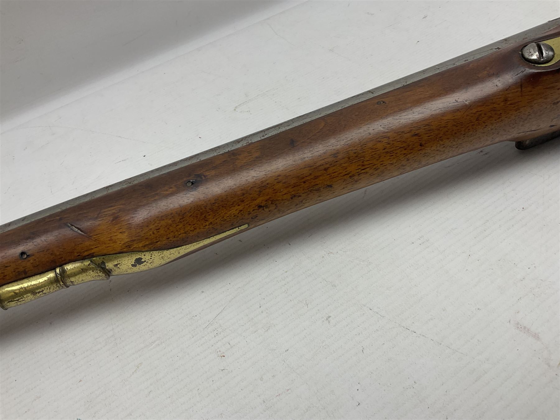 Brown Bess style 10-bore flintlock musket, the action marked with Crowned GR, 'Jordan' and dated 1758, the 104cm(41