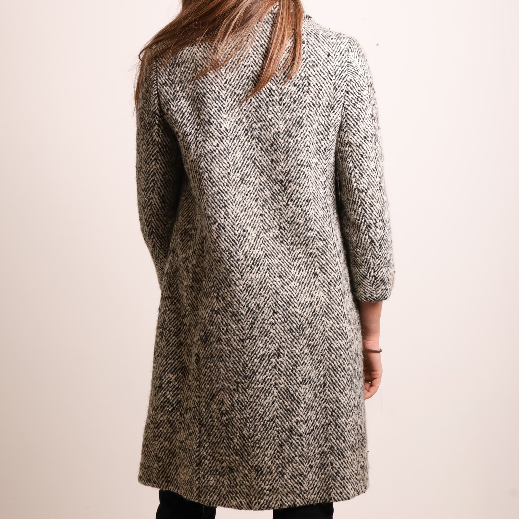 Barbour and Aquascutum - three ladies’ coats, comprising a Barbour Classic Duffle in dark brown wool blend with toggle fastenings and signature tartan lining, size UK 8, together with two Aquascutum herringbone wool coats, each double-breasted and fully lined, both bearing Regent Street London labels (3)