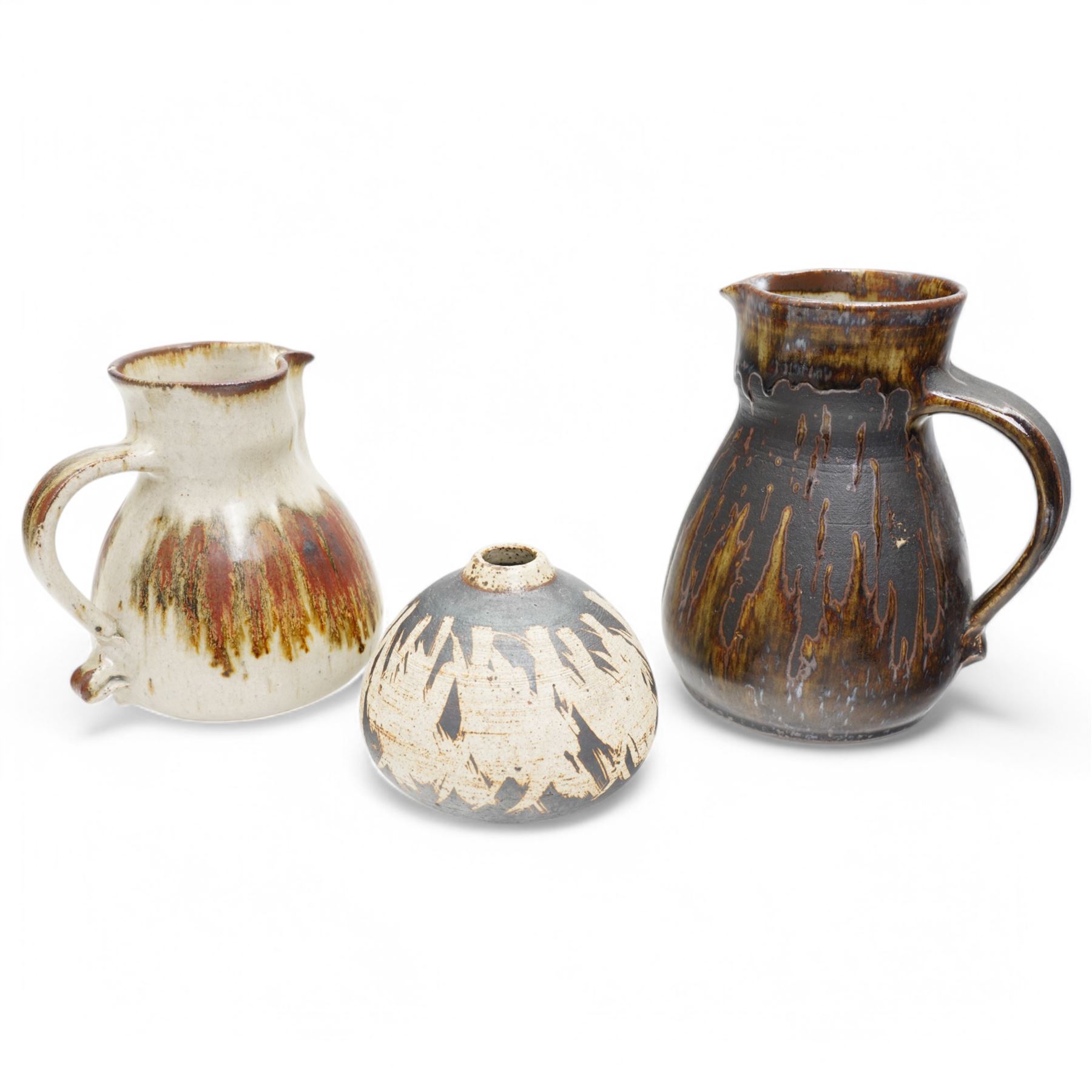 Barbara Cass (1921-1992) for Arden pottery; two studio pottery stoneware jugs, in brown and white glazes, impressed marks to bases, tallest H21cm, and another smaller vase (3)