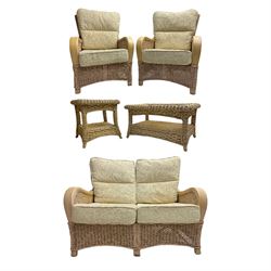 Contemporary rattan conservatory suite - two seat sofa with wicker frame and loose cushions upholstered in textured champagne fabric (W125cm H98cm); pair of matching armchairs (W72cm H98cm); rectangular glass-topped coffee table with rattan frame and undertier (W85cm D60cm H47cm); and matching square side table (W53cm H55cm)