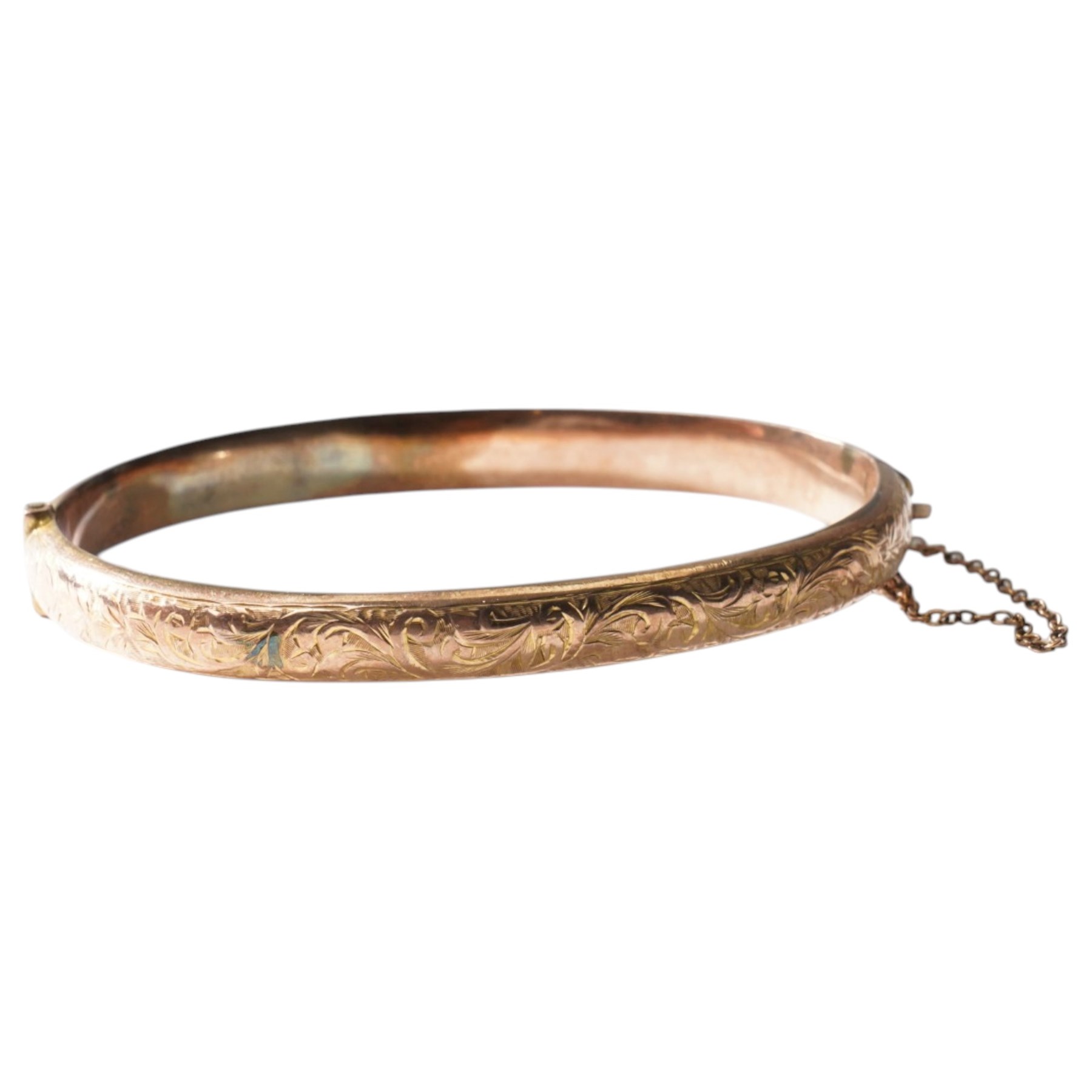 9ct gold hinged bangle with engraved decoration 