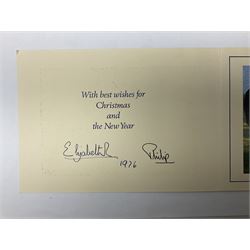 H.M. Queen Elizabeth II and H.R.H. The Duke of Edinburgh, signed 1976 Christmas card with twin gilt Royal cyphers to cover, colour photographic print of the Royal Family to interior, and signatures Elizabeth R and Philip with the manuscript date 1976 below