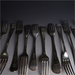 Seventeen Georgian and later silver Hanoverian pattern table and dessert forks, most with engraved initials to terminal and crests verso, including pair of table forks hallmarked William Sumner & Richard Crossley, London 1778