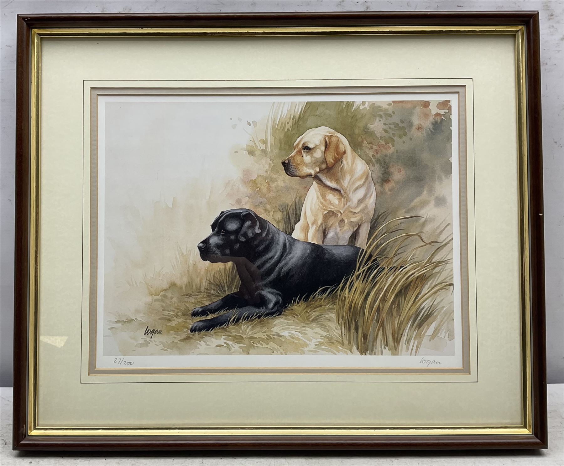 Eric R. Sturgeon (British 1920-1999): 'The Palace Gatehouse Wells', 'Bath Abbey', 'Pulteney Bridge' and 'Wells Cathedral', set of four lithographs signed in pencil and blind stamped, together with a print of Labradors, signed 'Logan' and numbered in pencil max. 43cm x 58cm (5)