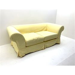 Pair traditional two seat sofas upholstered in pale yellow cover 