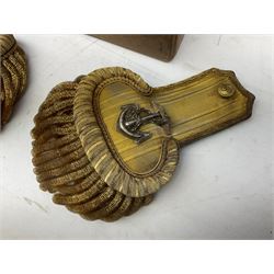 Pair of Royal Navy junior officer's bullion dress epaulettes with button above a silver bullion fouled anchor; in original cardboard box bearing remains of label 'Lieutenant J. ???'