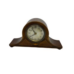 An Edwardian mantle clock in mahogany with stringing and inlay, with silvered dial and quartz movement.
Together with another Edwardian mantle clock case in burr walnut with silvered dial and bezel. No movement.