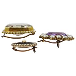 Early 20th century gold amethyst and split pearl brooch, gold quartz and seed pearl brooch, stamped 15ct and one other mourning brooch, stamped 9ct